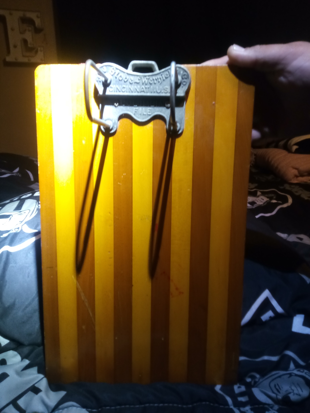 Columbia Metal Hook Wall Rack on Yellow and Brown Striped Wood